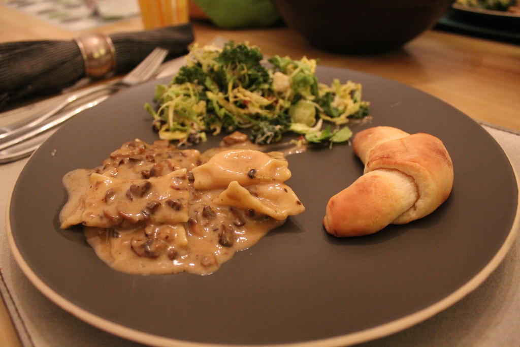 Truffle Cream Sauce with Agniolotti, served with salad and a roll