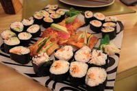 Sushi (crab rolls in the foreground)